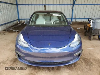 2018 Tesla Model 3 Long Range Battery z VIN 5YJ3E1EB3JF134664, wystawiony jako Copart lot #57288485 z przebiegiem Nie podano mil oraz Szkoda całkowita • Salvage title. Historia ofert i sprzedaży dostępna na DreamBid. Obrazek 5.