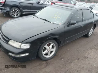 1998 Nissan Maxima GXE z VIN JN1CA21A7WM805575, wystawiony jako IAAI lot #41726198 z przebiegiem Nie podano mil oraz . Historia ofert i sprzedaży dostępna na DreamBid. Obrazek 6.