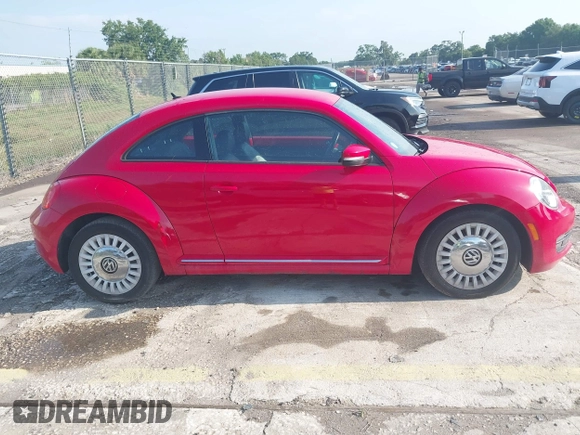 2013 Volkswagen Beetle 2.5L w/Sun/Sound/Nav with VIN 3VWJX7AT4DM672158, listed as a IAAI auction lot 42187543 with 94,961 mi miles and . Bid and sale history available at DreamBid. Image 13.