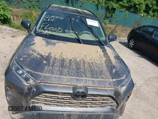 2021 Toyota RAV4 XLE with VIN 2T3P1RFV1MC214257, listed as a IAAI auction lot 42297014 with Not provided miles and . Bid and sale history available at DreamBid. Image 6.