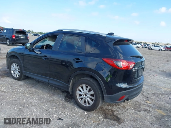 2014 Mazda CX-5 Touring with VIN JM3KE2CYXE0384987, listed as a IAAI auction lot 42052196 with 151,765 mi miles. Bid and sale history available at carsss.com. Image 3.