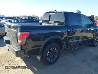2024 Nissan Titan Pro-4X with VIN 1N6AA1ED9RN113154, listed as a IAAI auction lot 41352672 with 11,753 mi miles and . Bid and sale history available at DreamBid. Image 4.