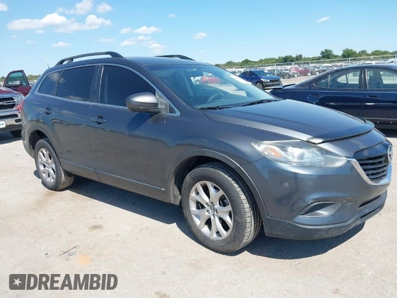 2015 Mazda CX-9 Sport with VIN JM3TB2BA7F0465965, listed as a IAAI auction lot 40348982 with 165,284 mi miles and . Bid and sale history available at carsss.com. Image 1.
