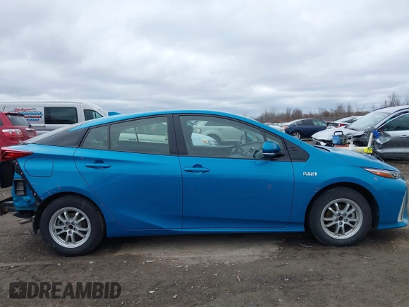 2017 Toyota Prius Plus z VIN JTDKARFP0H3016014, wystawiony jako IAAI lot #41797703 z przebiegiem 80 657 mil mil oraz . Historia ofert i sprzedaży dostępna na DreamBid. Obrazek 14.
