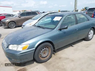 2001 Toyota Camry CE z VIN JT2BG22K310536515, wystawiony jako IAAI lot #42409847 z przebiegiem 205 978 mil mil oraz . Historia ofert i sprzedaży dostępna na DreamBid. Obrazek 2.