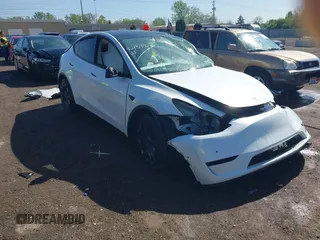2021 Tesla Model Y Performance z VIN 5YJYGDEF0MF076263, wystawiony jako IAAI lot #42134022 z przebiegiem Nie podano mil oraz . Historia ofert i sprzedaży dostępna na DreamBid. Obrazek 1.