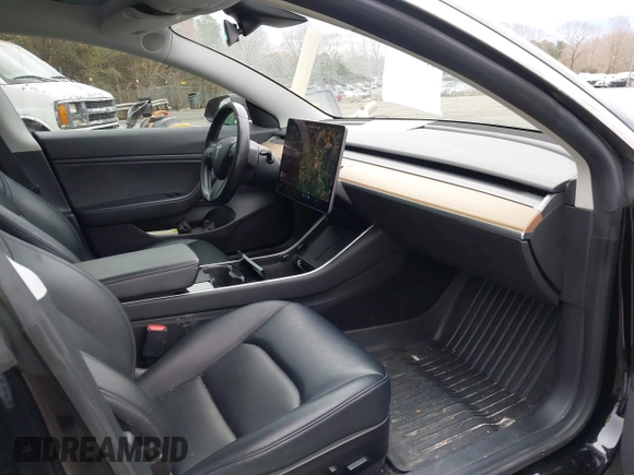 2019 Tesla Model 3 Mid Range with VIN 5YJ3E1EA3KF313425, listed as a IAAI auction lot 41806388 with 110,767 mi miles and . Bid and sale history available at carsss.com. Image 5.