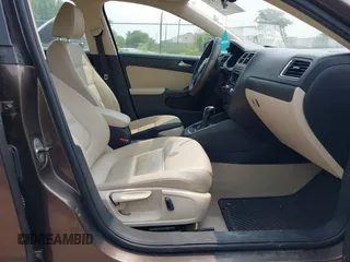 2014 Volkswagen Jetta SE with VIN 3VWD07AJ7EM251973, listed as a IAAI auction lot 42415573 with 124,323 mi miles and . Bid and sale history available at DreamBid. Image 5.