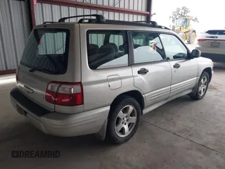 2001 Subaru Forester S w/Premium Pkg with VIN JF1SF65621H736695, listed as a IAAI auction lot 41551303 with 281,518 mi miles. Bid and sale history available at carsss.com. Image 4.