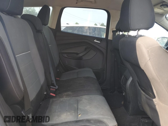 2014 Ford Escape SE z VIN 1FMCU9GX5EUC60849, wystawiony jako Copart lot #60498575 z przebiegiem Nie podano mil oraz Szkoda całkowita • Salvage title. Historia ofert i sprzedaży dostępna na DreamBid. Obrazek 11.