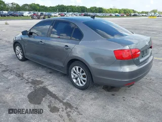 2011 Volkswagen Jetta SE with VIN 3VWDZ7AJ2BM080390, listed as a IAAI auction lot 42723802 with 157,117 mi miles and . Bid and sale history available at DreamBid. Image 3.