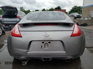 2009 Nissan 370Z Touring with VIN JN1AZ44E69M404789, listed as a Copart auction lot 62015094 with 56,447 mi miles and Salvage Title. Bid and sale history available at carsss.com. Image 6.