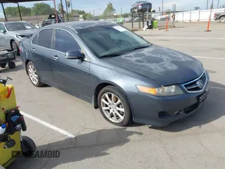 2006 Acura TSX with VIN JH4CL96826C004546, listed as a IAAI auction lot 42022153 with 282,351 mi miles. Bid and sale history available at carsss.com. Image 1.