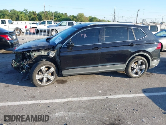 2018 Volkswagen Tiguan SEL Premium with VIN 3VV5B7AX1JM002585, listed as a IAAI auction lot 40495823 with 82,376 mi miles and . Bid and sale history available at DreamBid. Image 18.