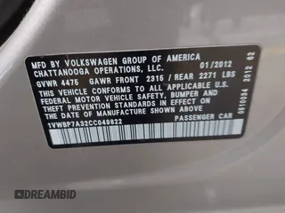2012 Volkswagen Passat SE z VIN 1VWBP7A32CC049822, wystawiony jako IAAI lot #41634650 z przebiegiem 130 896 mil mil oraz . Historia ofert i sprzedaży dostępna na DreamBid. Obrazek 9.