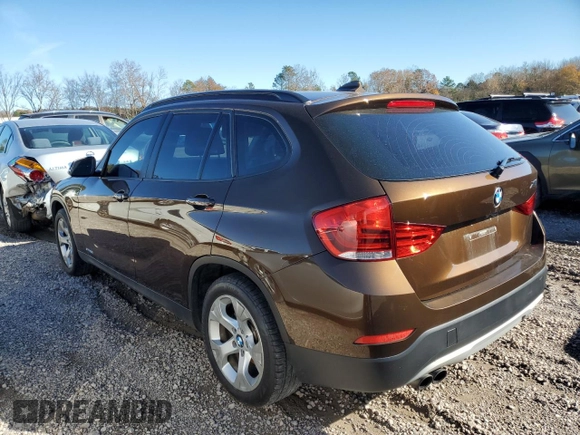 2015 BMW X1 sDrive28i with VIN WBAVM1C54FV316825, listed as a Copart auction lot 83592644 with 76,823 mi miles and Salvage Title. Bid and sale history available at carsss.com. Image 2.