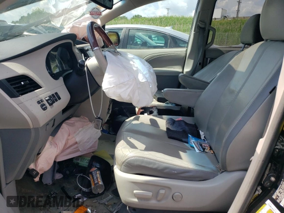 2011 Toyota Sienna XLE with VIN 5TDDK3DC8BS020059, listed as a Copart auction lot 62954985 with 219,974 mi miles and Salvage title. Bid and sale history available at DreamBid. Image 7.
