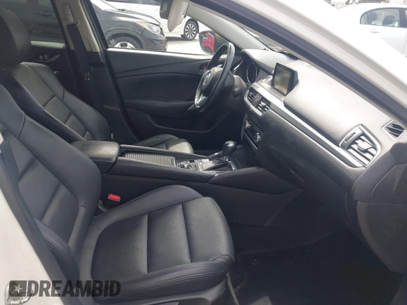 2016 Mazda Mazda6 i Touring with VIN JM1GJ1V57G1429887, listed as a IAAI auction lot 42029170 with 140,519 mi miles. Bid and sale history available at carsss.com. Image 5.
