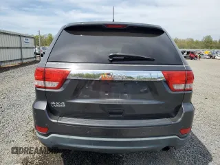 2011 Jeep Grand Cherokee Laredo z VIN 1J4RR4GG8BC738468, wystawiony jako Copart lot #54907215 z przebiegiem 182 576 mil mil oraz Szkoda całkowita • Salvage title. Historia ofert i sprzedaży dostępna na DreamBid. Obrazek 6.