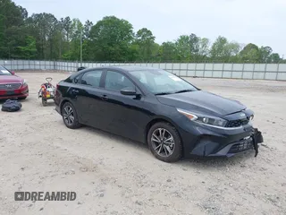 2023 Kia Forte LXS with VIN 3KPF24AD1PE594919, listed as a IAAI auction lot 42158476 with 34,719 mi miles and . Bid and sale history available at DreamBid. Image 1.