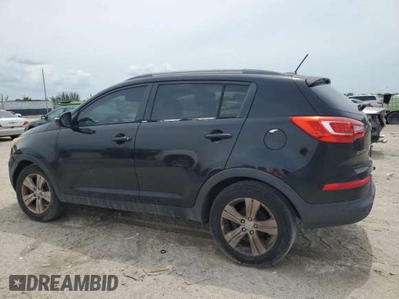 2013 Kia Sportage LX z VIN KNDPB3A20D7393554, wystawiony jako Copart lot #59036015 z przebiegiem 145 977 mil mil oraz Szkoda całkowita • Salvage title. Historia ofert i sprzedaży dostępna na DreamBid. Obrazek 2.