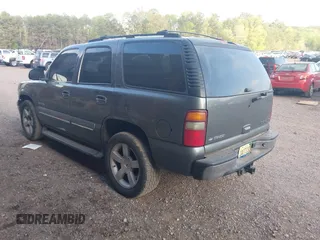 2002 Chevrolet Tahoe LT with VIN 1GNEC13Z92R273473, listed as a IAAI auction lot 41841071 with 290,007 mi miles. Bid and sale history available at carsss.com. Image 3.