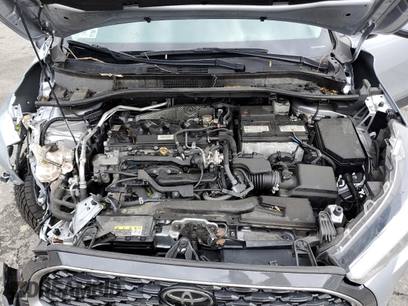 2022 Toyota Corolla Cross XLE with VIN 7MUDAABG2NV009663, listed as a Copart auction lot 55945735 with 59,473 mi miles and Salvage title. Bid and sale history available at DreamBid. Image 12.