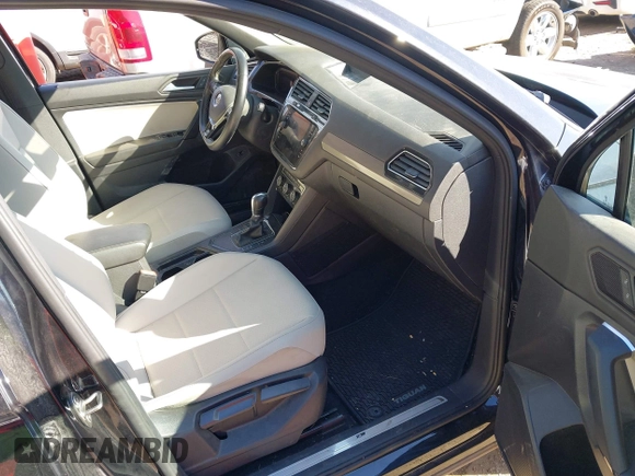 2019 Volkswagen Tiguan SE with VIN 3VV3B7AX2KM075179, listed as a IAAI auction lot 41728654 with 108,388 mi miles and . Bid and sale history available at DreamBid. Image 5.