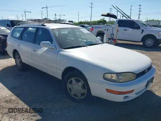 1992 Toyota Camry z VIN 4T1VK12W7NU042538, wystawiony jako IAAI lot #42526827 z przebiegiem 74 463 mil mil oraz . Historia ofert i sprzedaży dostępna na DreamBid. Obrazek 1.