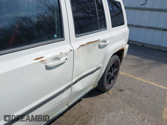2010 Jeep Patriot Sport with VIN 1J4NT2GB5AD589535, listed as a IAAI auction lot 42021916 with 175,797 mi miles and . Bid and sale history available at carsss.com. Image 6.