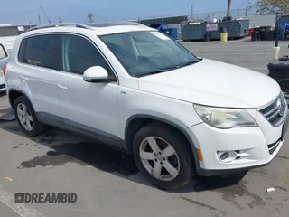 2010 Volkswagen Tiguan SE with VIN WVGAV7AX6AW529988, listed as a IAAI auction lot 42383150 with 105,874 mi miles and . Bid and sale history available at DreamBid. Image 1.
