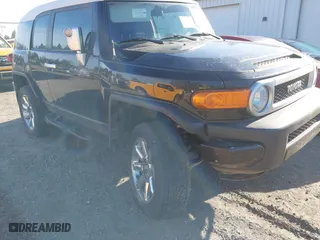 2008 Toyota FJ Cruiser with VIN JTEBU11F780104062, listed as a IAAI auction lot 41010076 with 220,975 mi miles. Bid and sale history available at carsss.com. Image 6.