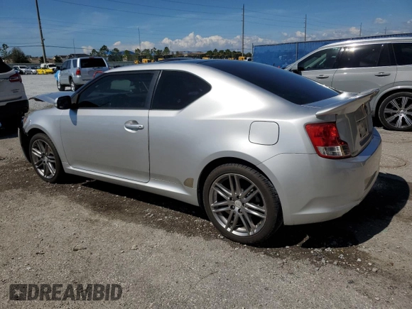 2011 Scion tC with VIN JTKJF5C74B3010047, listed as a Copart auction lot 47317555 with 125,659 mi miles and Salvage Title. Bid and sale history available at carsss.com. Image 2.