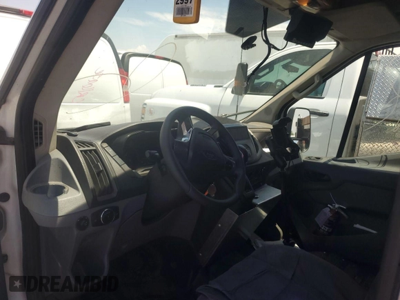 2015 Ford Transit z VIN 1FTCR3XV7FKA20765, wystawiony jako IAAI lot #42713692 z przebiegiem 280 464 mil mil oraz . Historia ofert i sprzedaży dostępna na DreamBid. Obrazek 17.