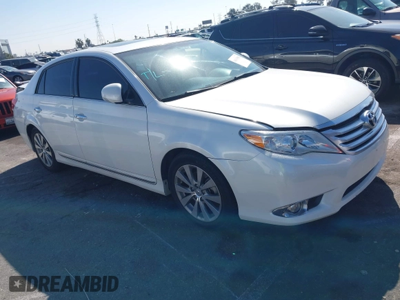 2012 Toyota Avalon with VIN 4T1BK3DB1CU469574, listed as a IAAI auction lot 41633881 with 128,425 mi miles and . Bid and sale history available at DreamBid. Image 1.