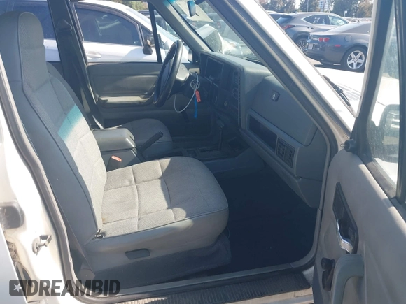1996 Jeep Cherokee Sport with VIN 1J4FT68S7TL265733, listed as a IAAI auction lot 42499228 with 230,001 mi miles and . Bid and sale history available at DreamBid. Image 5.