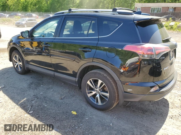 2018 Toyota RAV4 XLE with VIN 2T3WFREVXJW471443, listed as a Copart auction lot 54890655 with 131,677 mi miles and Salvage title. Bid and sale history available at DreamBid. Image 2.