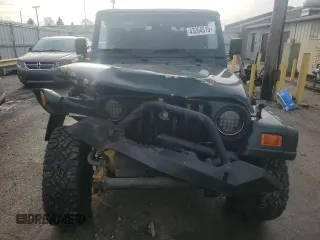 2001 Jeep Wrangler Sahara with VIN 1J4FA59S51P324010, listed as a Copart auction lot 43264515 with 163,056 mi miles and Salvage Title. Bid and sale history available at carsss.com. Image 5.
