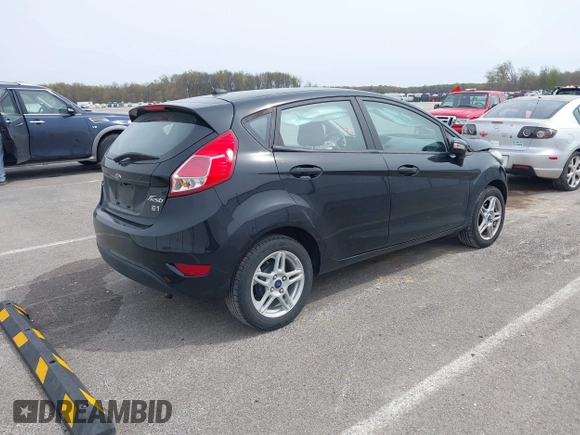 2018 Ford Fiesta SE with VIN 3FADP4EJ3JM132132, listed as a IAAI auction lot 42057403 with 75,944 mi miles and . Bid and sale history available at DreamBid. Image 4.