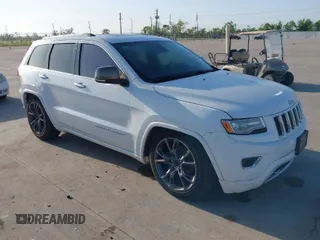 2014 Jeep Grand Cherokee Overland with VIN 1C4RJFCG6EC579985, listed as a IAAI auction lot 42025215 with 126,761 mi miles. Bid and sale history available at carsss.com. Image 1.
