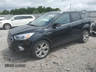 2019 Ford Escape Titanium with VIN 1FMCU0J90KUA31920, listed as a Copart auction lot 61237675 with 57,749 mi miles and Salvage title. Bid and sale history available at DreamBid. Image 1.