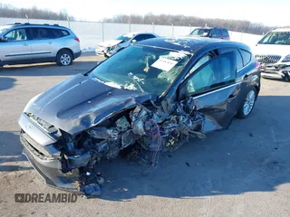 2015 Ford Focus Titanium z VIN 1FADP3N23FL368324, wystawiony jako IAAI lot #41387070 z przebiegiem Nie podano mil oraz . Historia ofert i sprzedaży dostępna na DreamBid. Obrazek 2.