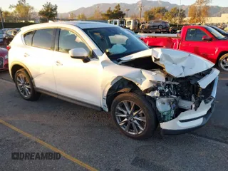 2019 Mazda CX-5 Grand Touring with VIN JM3KFADM2K1654321, listed as a IAAI auction lot 41145076 with 35,126 mi miles. Bid and sale history available at carsss.com. Image 1.