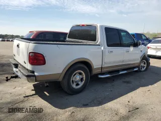 2002 Ford F-150 XLT with VIN 1FTRW07L32KE29159, listed as a Copart auction lot 50596125 with 198,058 mi miles and Salvage Title. Bid and sale history available at carsss.com. Image 3.