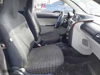 2013 Scion iQ with VIN JTNJJXB00DJ025113, listed as a IAAI auction lot 41503756 with 105,557 mi miles. Bid and sale history available at carsss.com. Image 5.
