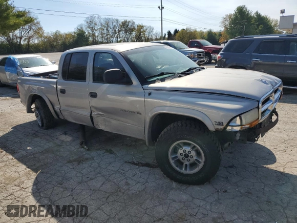 2000 Dodge Dakota Sport with VIN 1B7GG2AN4YS759962, listed as a Copart auction lot 76672814 with 196,108 mi miles and Salvage Title. Bid and sale history available at carsss.com. Image 4.