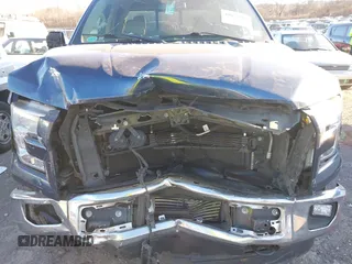 2015 Ford F-150 XLT with VIN 1FTEW1EP7FFD00589, listed as a IAAI auction lot 41677203 with 156,064 mi miles. Bid and sale history available at carsss.com. Image 6.