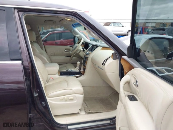 2012 Infiniti QX56 7-passenger with VIN JN8AZ2NE1C9017551, listed as a IAAI auction lot 41828339 with 203,551 mi miles. Bid and sale history available at carsss.com. Image 5.