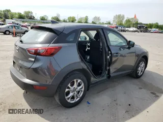 2018 Mazda CX-3 Touring z VIN JM1DKDC7XJ0300125, wystawiony jako Copart lot #54553765 z przebiegiem 83 652 mil mil oraz Szkoda całkowita • Salvage title. Historia ofert i sprzedaży dostępna na DreamBid. Obrazek 3.