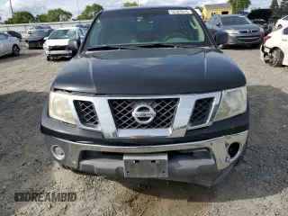 2009 Nissan Frontier SE with VIN 1N6BD06T09C409087, listed as a Copart auction lot 52325915 with 190,970 mi miles and Salvage title. Bid and sale history available at DreamBid. Image 5.
